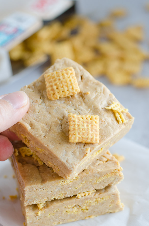 Picking up a protein bar topped with Chex cereal