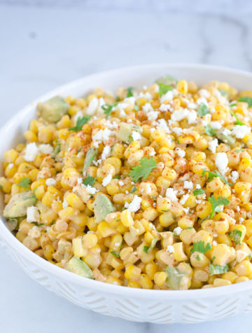 Bowl of corn salad with avocados