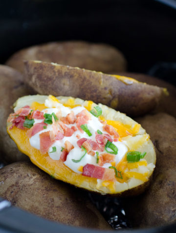 loaded baked potato with all the fixins in a crock pot