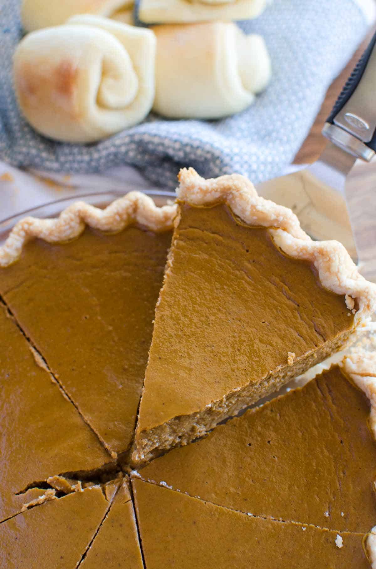 slice of pumpkin pie with fluted edges