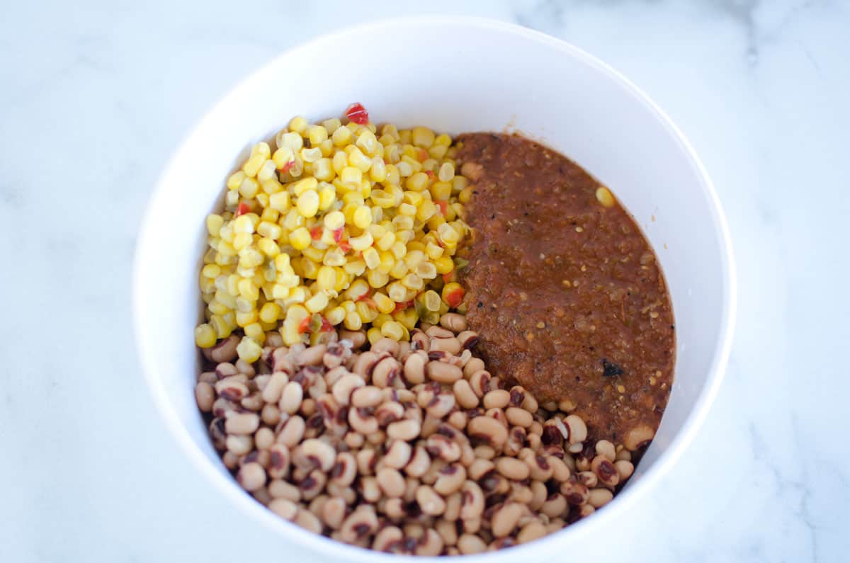 ingredients for black eyed peas dip in a bowl