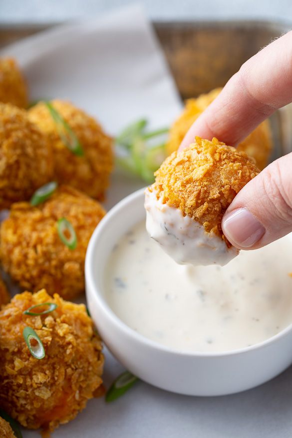 buffalo chicken bite dipped into ranch sauce