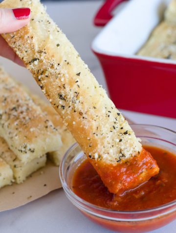 homemade pizza hut breadstick dipped in pizza sauce