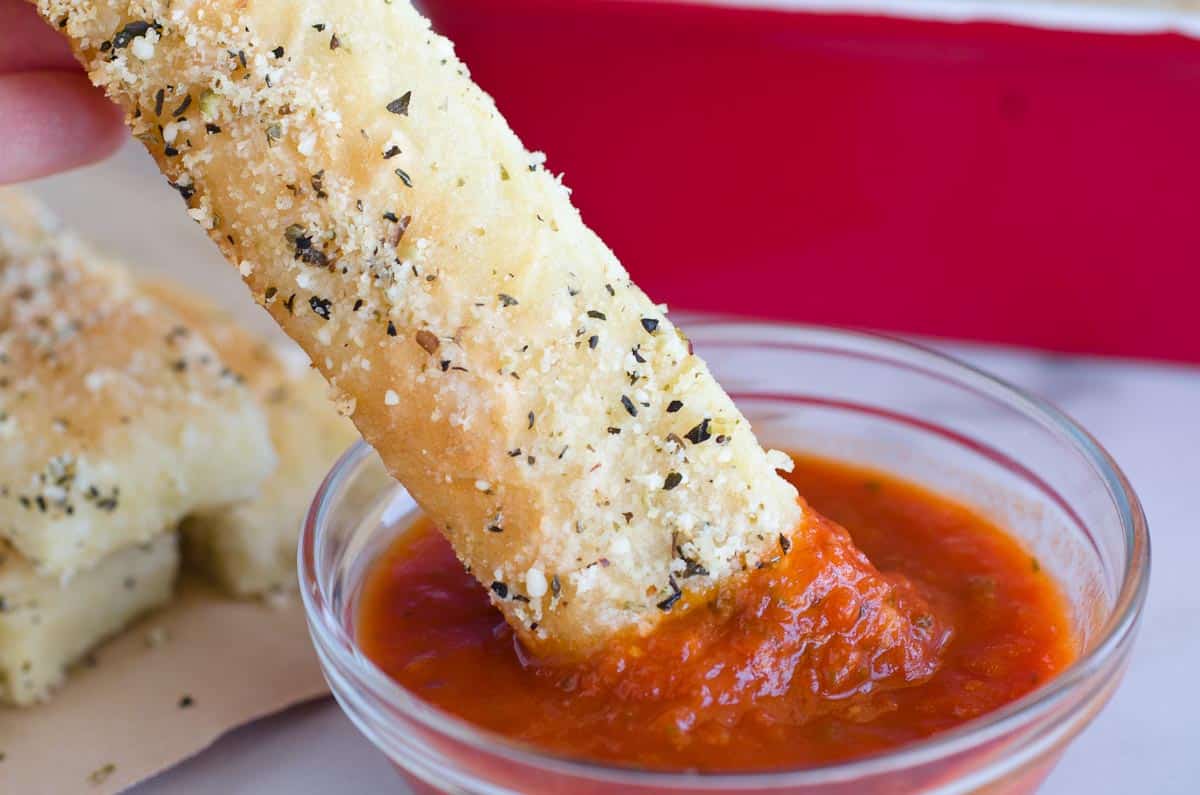 homemade pizza hut breadstick dipped into pizza sauce