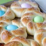braided Italian Easter bread with dyed eggs in center