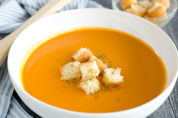 bowl of tomato soup with croutons