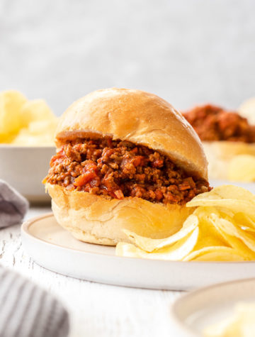 sloppy joe on a plate with chips