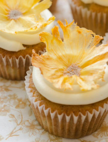 cupcake with pineapple flower topper