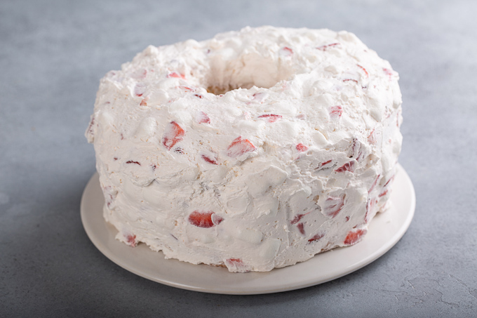 cake covered with strawberry frosting