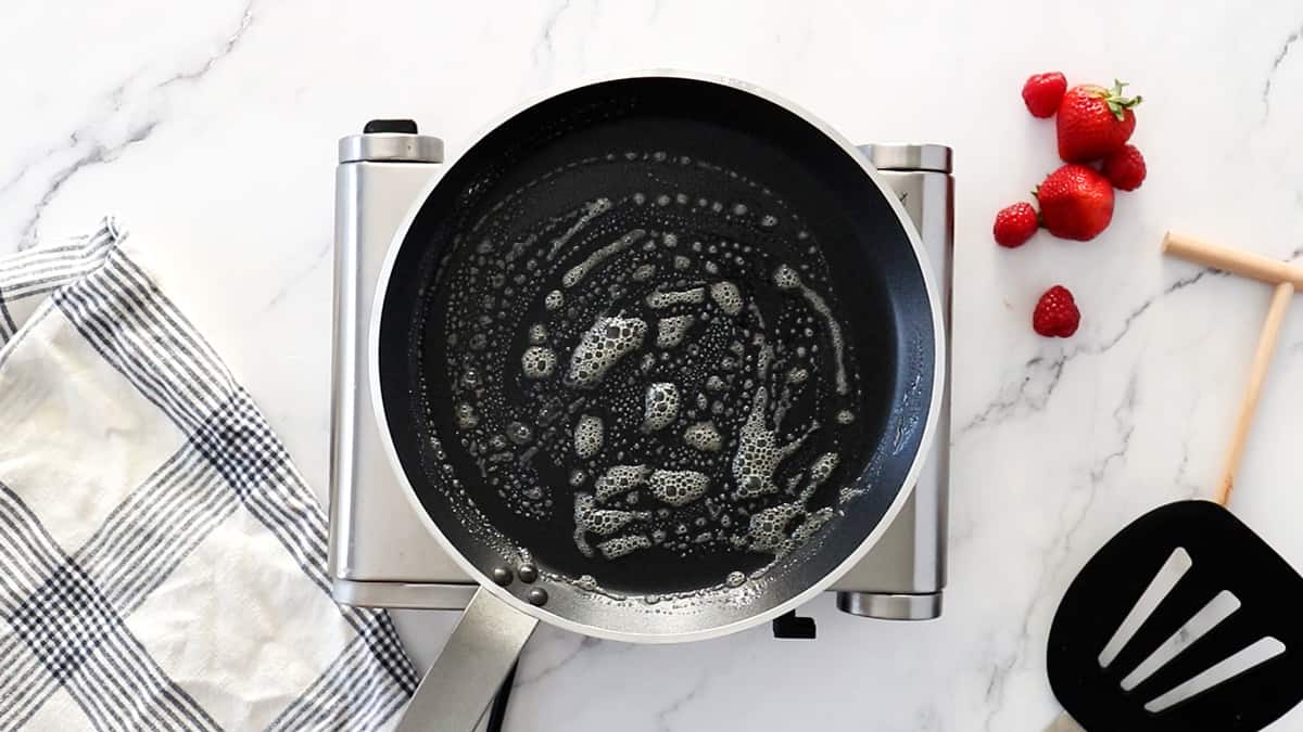 bubbly butter in hot skillet for crepes