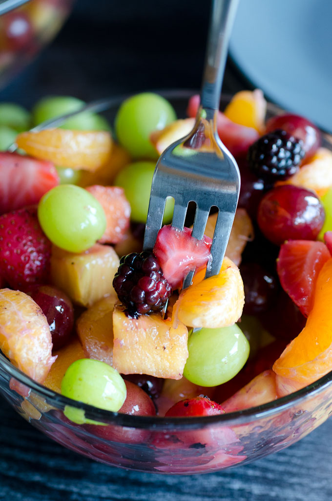 fork in bowl of fruit