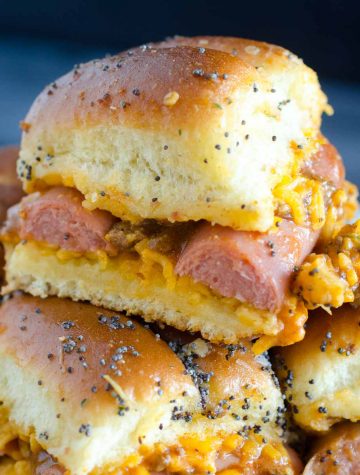 slider rolls with hot dogs and chili cheese sauce