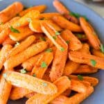 glazed baby carrots on a plate