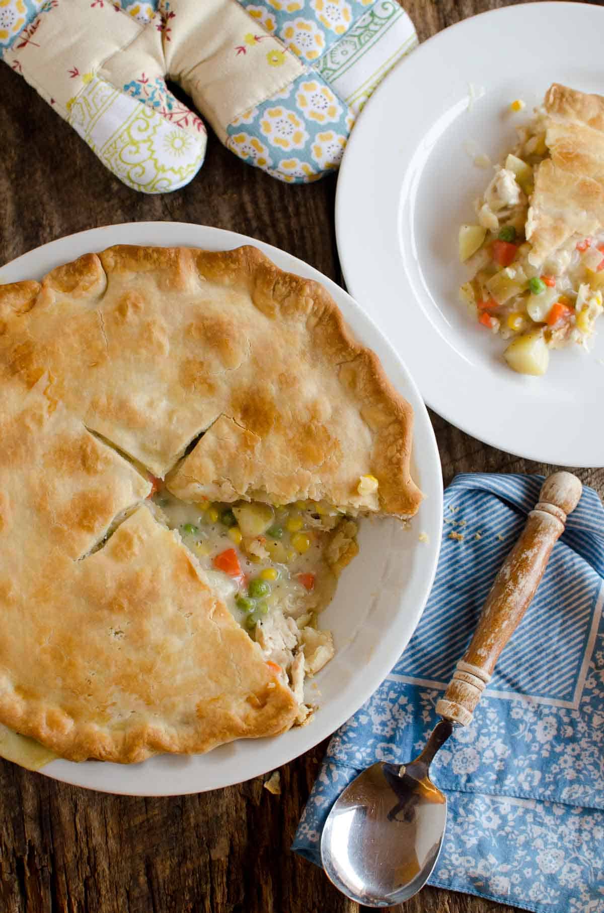 chicken pot pie with serving spoon and invidual plate