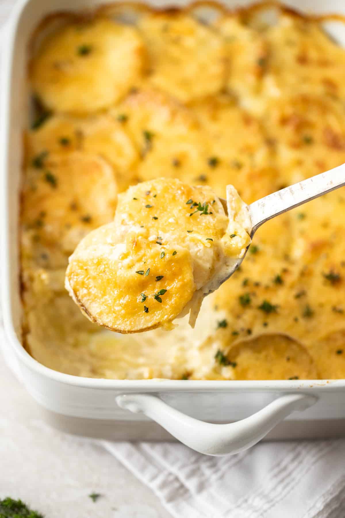 scalloped potatoes served from casserole dish