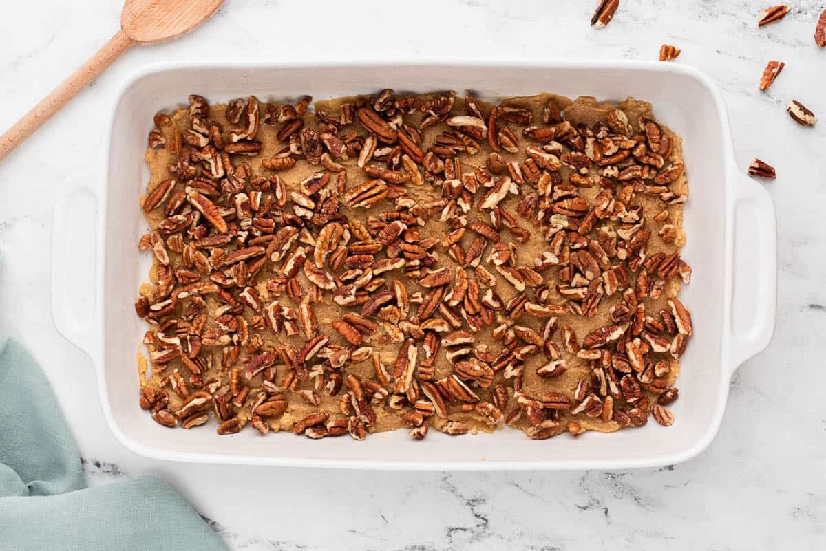 filling and pecan layered in baking dish