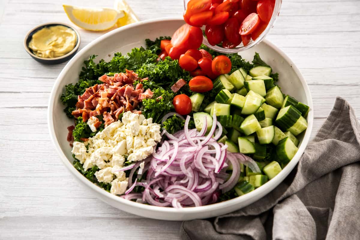 kale salad ingredients in a bowl