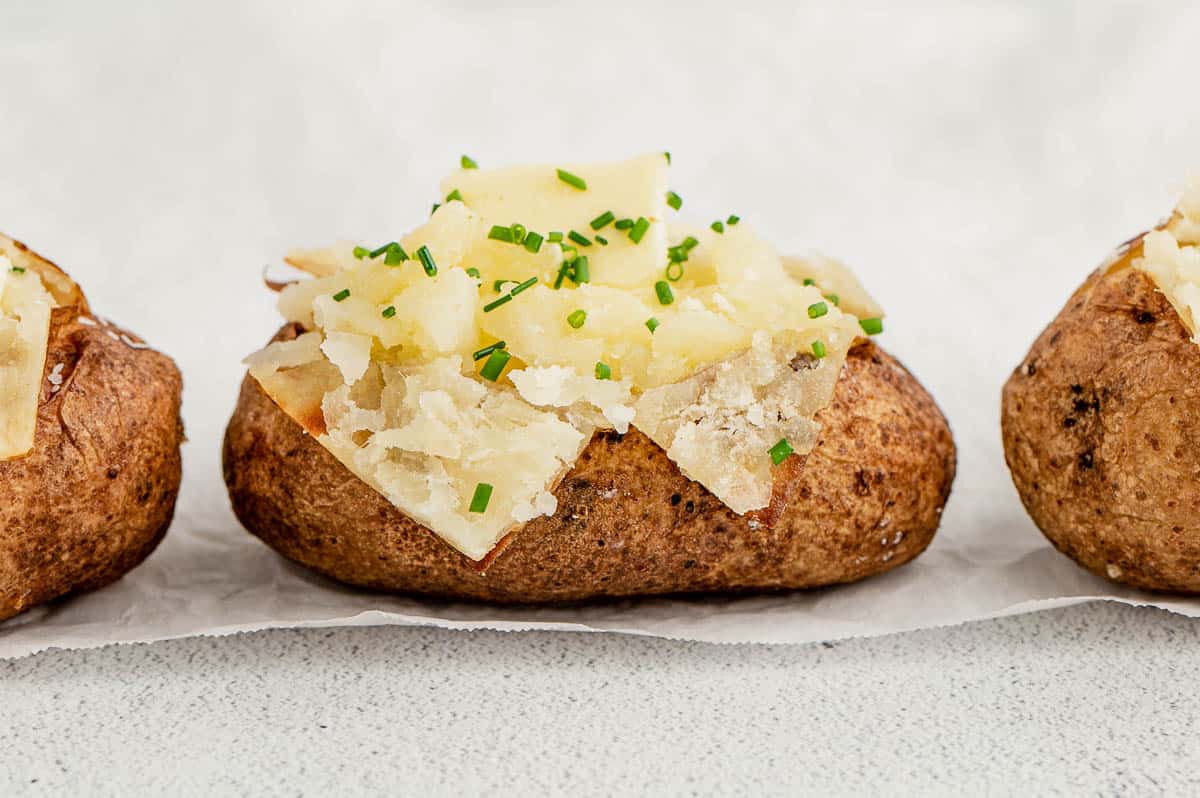 fluffy baked potato with butter topping