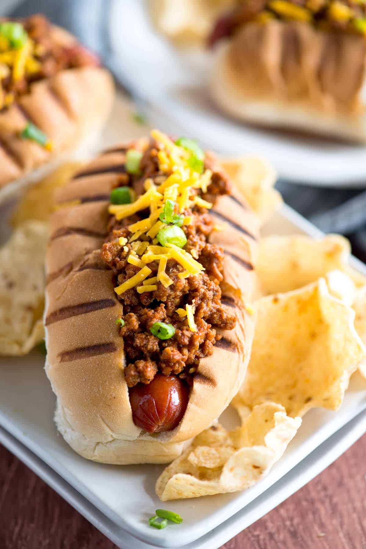 michigan hot dog on a plate with chips