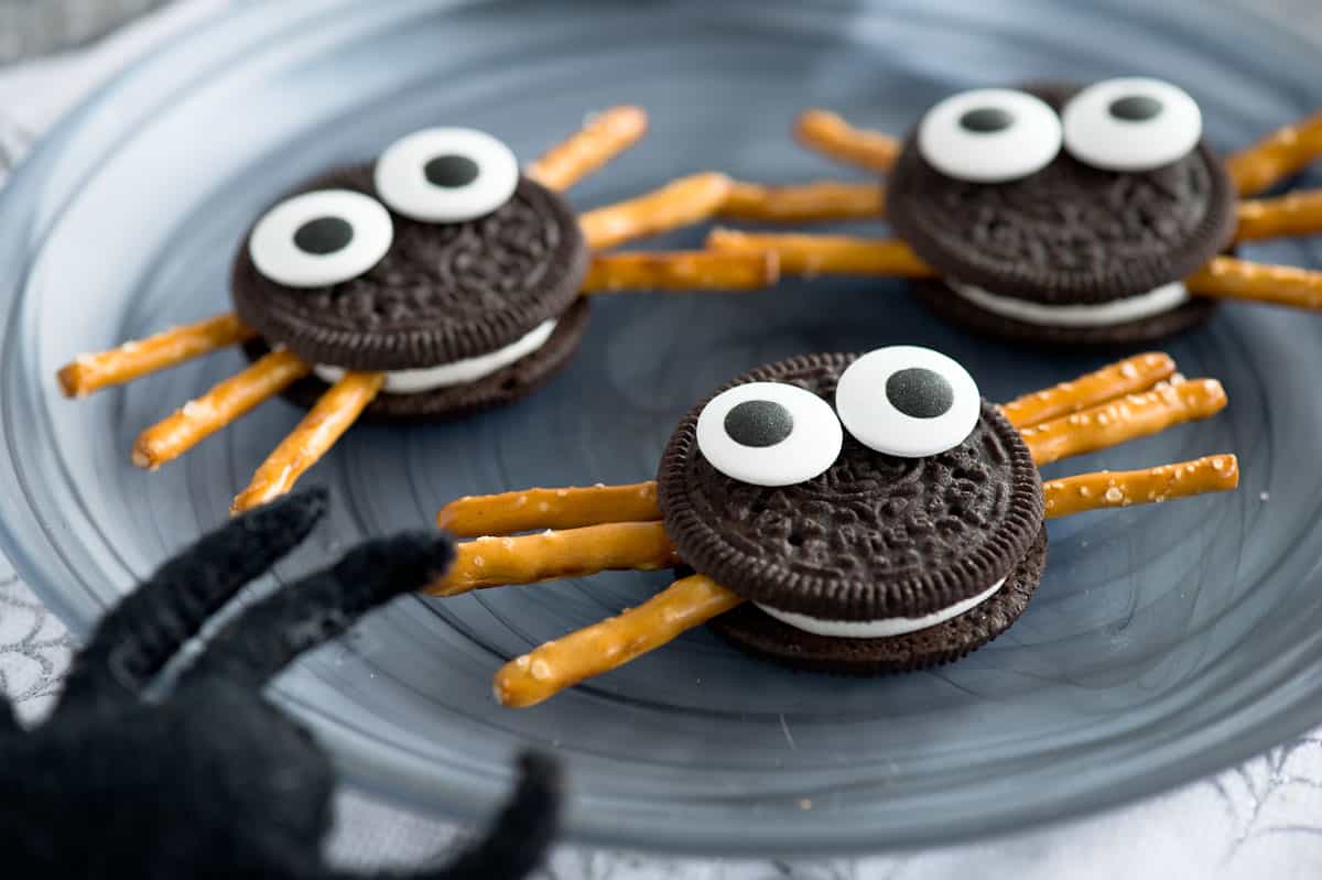 oreo spider cookies on a plate