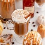 feature image of pumpkin spice latte recipe with whipped cream on top