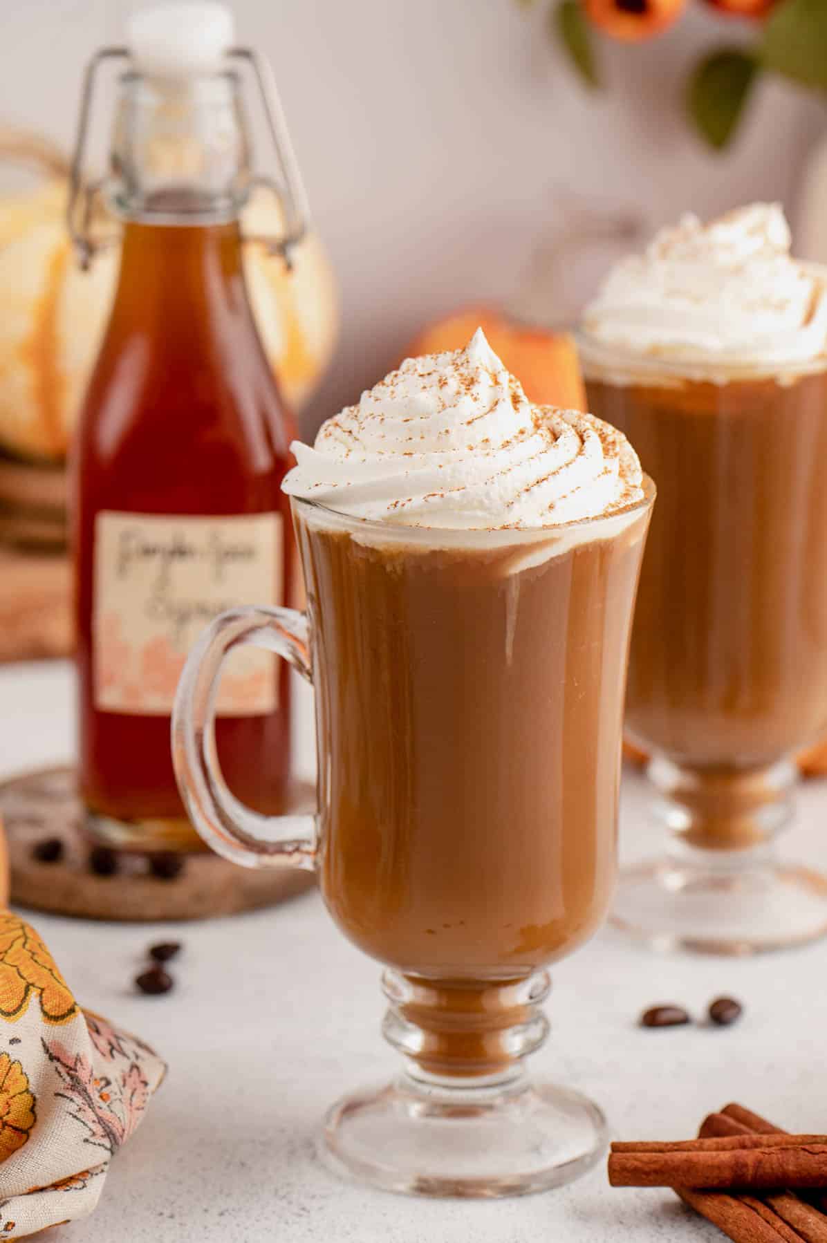 pumpkin spice latte topped with whipped cream