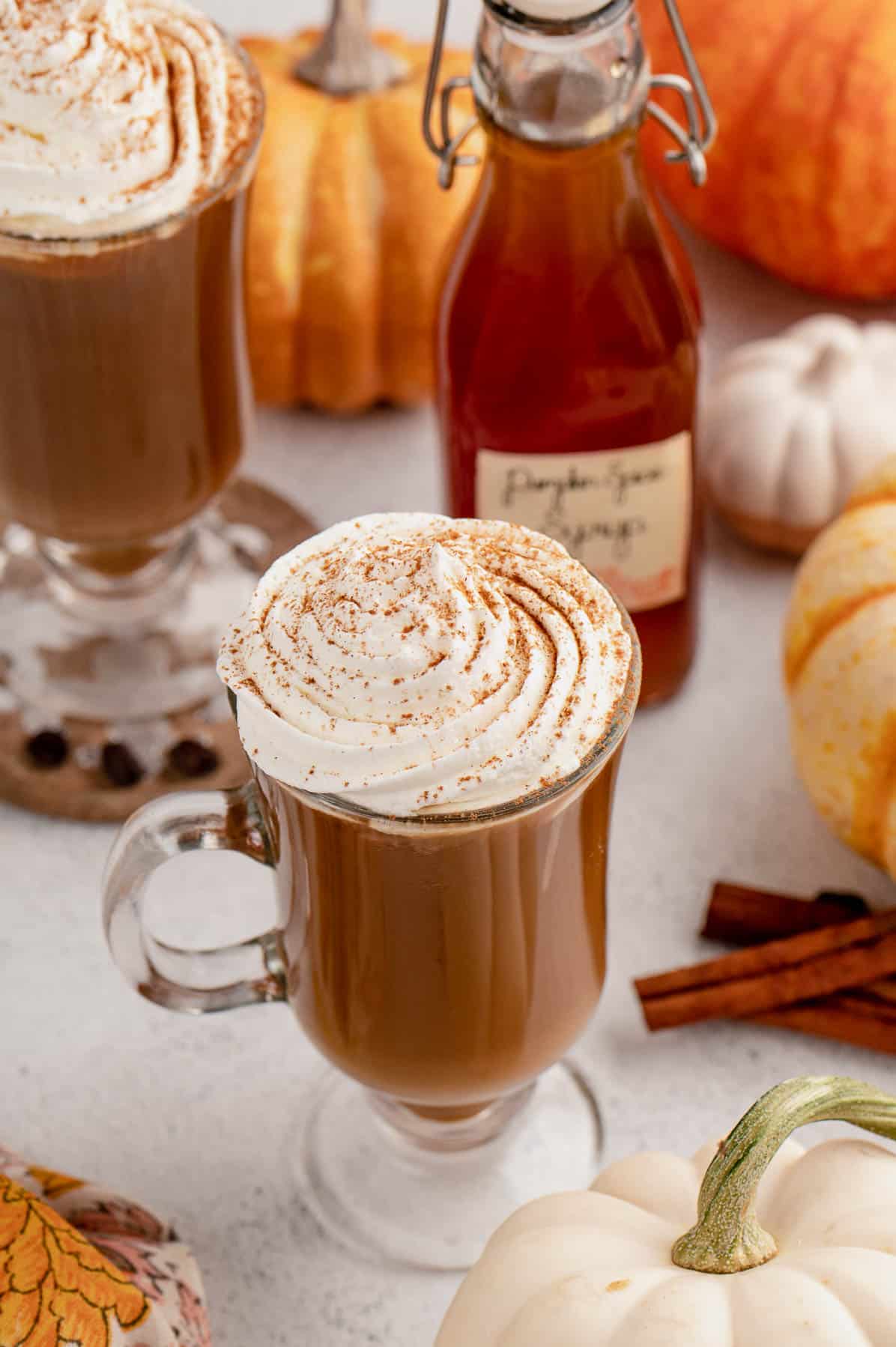 pumpkin spice latte with whipped cream and dusted with cinnamon