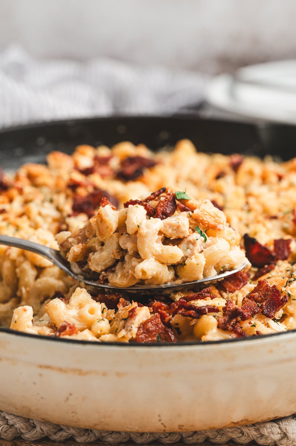 scoop of mac and cheese from skillet