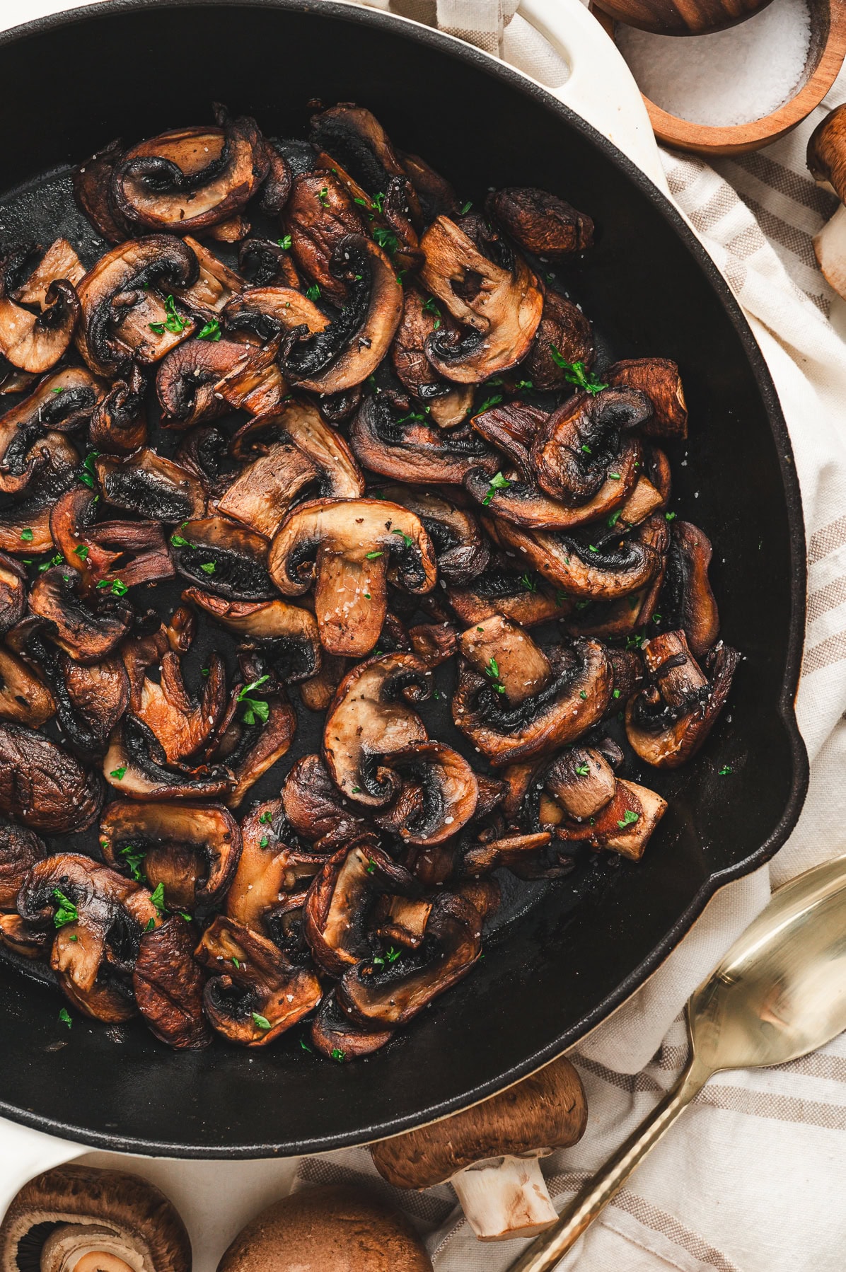 cooked mushrooms in a cast iron skillet