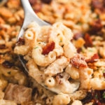 chicken ranch mac and cheese in a spoon with bacon pieces