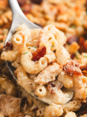 chicken ranch mac and cheese in a spoon with bacon pieces