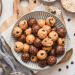 chocolate chip protein energy bites on a round plate